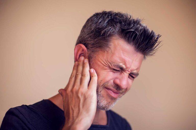 What is tinnitus? Symptoms, causes, and ways to cope